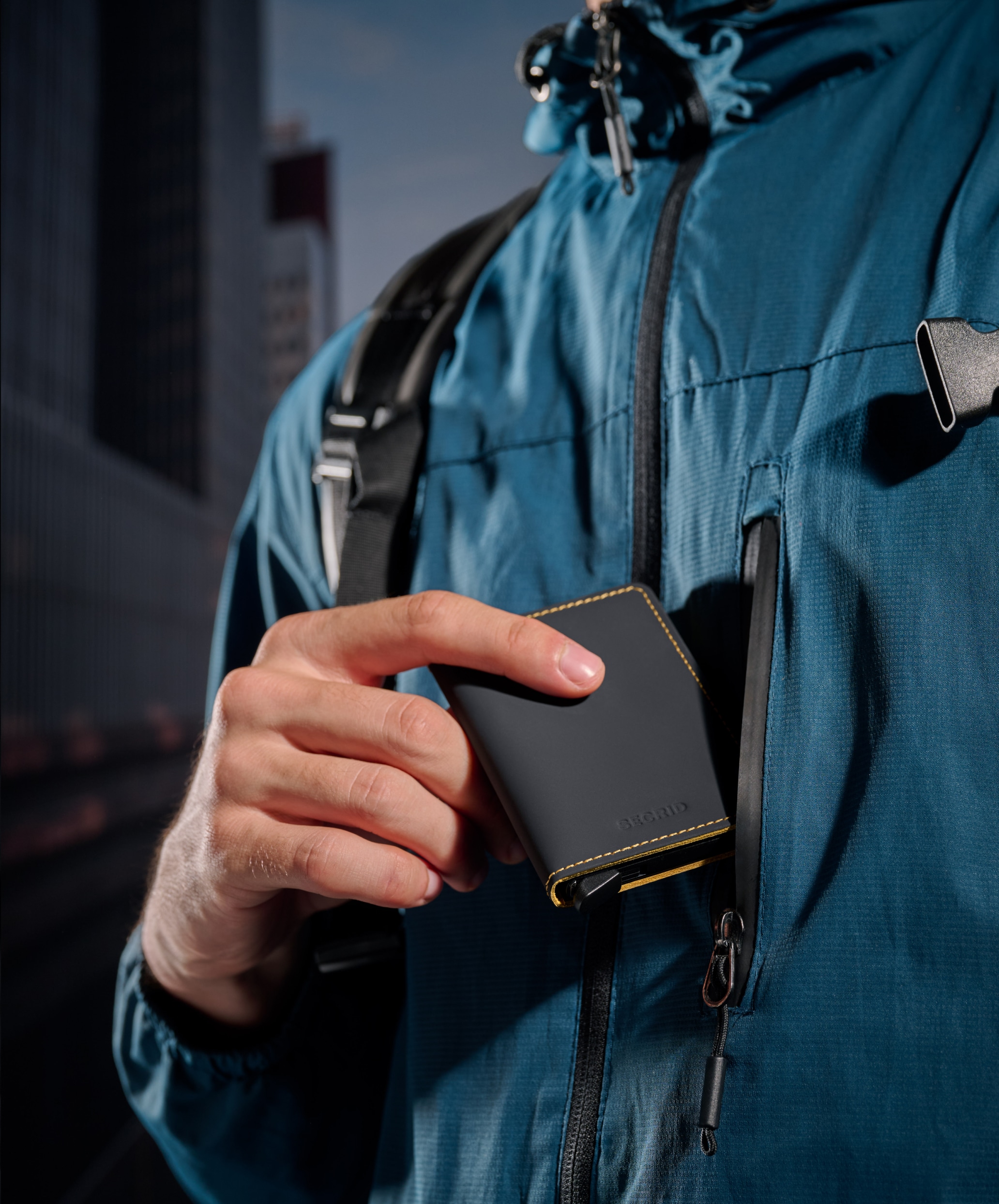 Real life image of the slimwallet-matte-black-ochre wallet